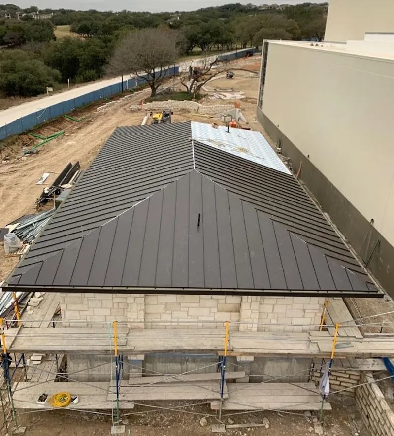 Metal roof new construction with scaffolding in Jessup